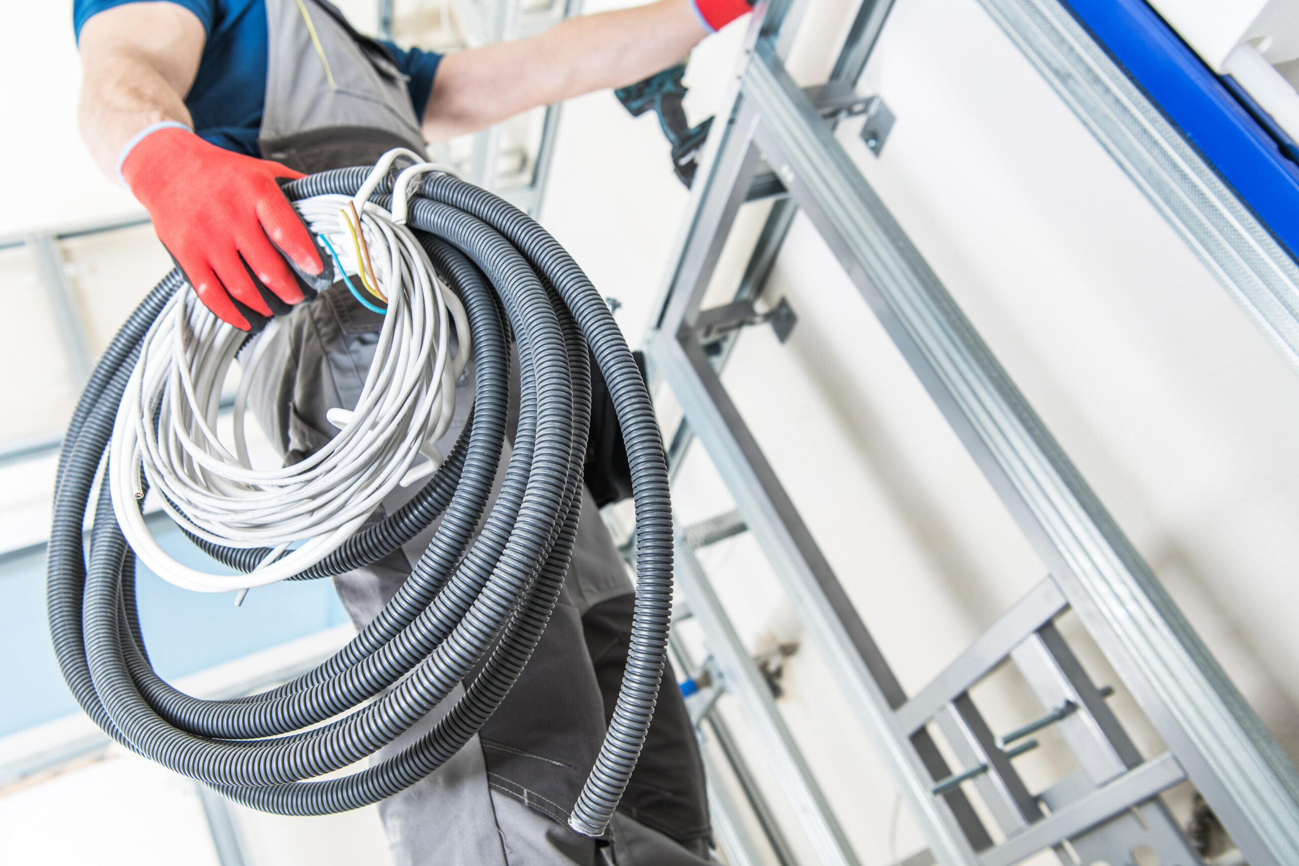 Construction,Worker,Preparing,Electrical,System,Installation,Inside,The,Newly,Remodeled
